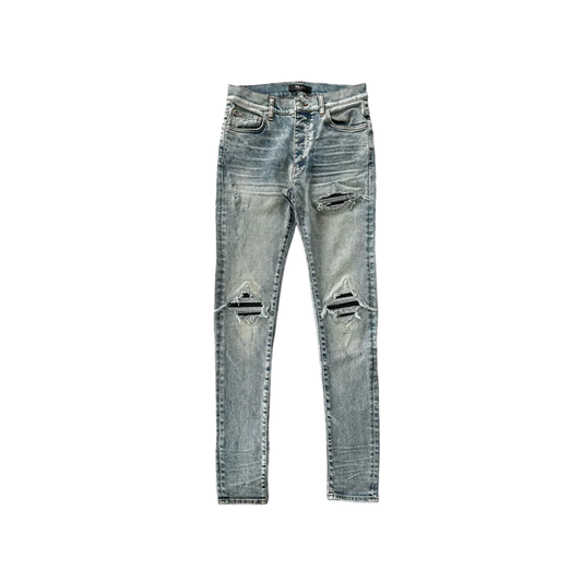 AMIRI STONE INDIGO & BLACK PATCH MX1 JEANS