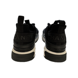 PREOVED CHANEL VELVET CALFSKIN CC TRAINERS IN BLACK