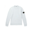 STONE ISLAND LOGO APPLIQUED GARMENT-DYED COTTON SWEATER IN BLUE