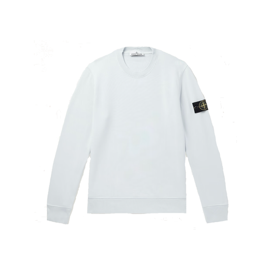 STONE ISLAND LOGO APPLIQUED GARMENT-DYED COTTON SWEATER IN BLUE