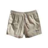AMIRI CORE LOGO SWIM SHORTS IN TAN