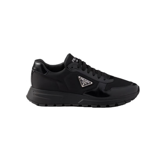 PRADA PRAX 01 RE-NYLON AND BRUSHED LEATHER TRAINERS IN BLACK