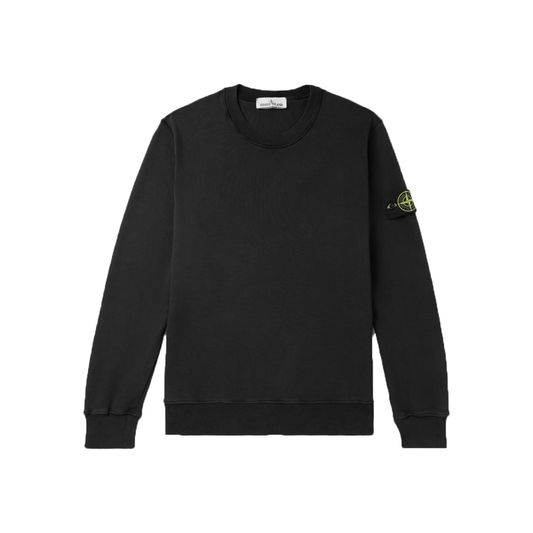 STONE ISLAND  LOGO APPLIQUED GARMENT DYED SWEATER IN BLACK