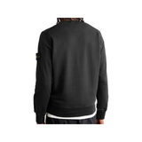 STONE ISLAND  LOGO APPLIQUED GARMENT DYED SWEATER IN BLACK