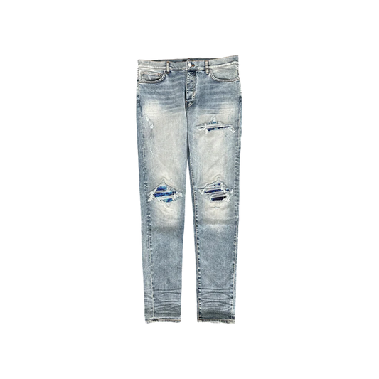 AMIRI STONE INDIGO TIE-DYE PATCH MX1 JEANS
