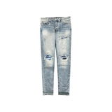 AMIRI STONE INDIGO TIE-DYE PATCH MX1 JEANS