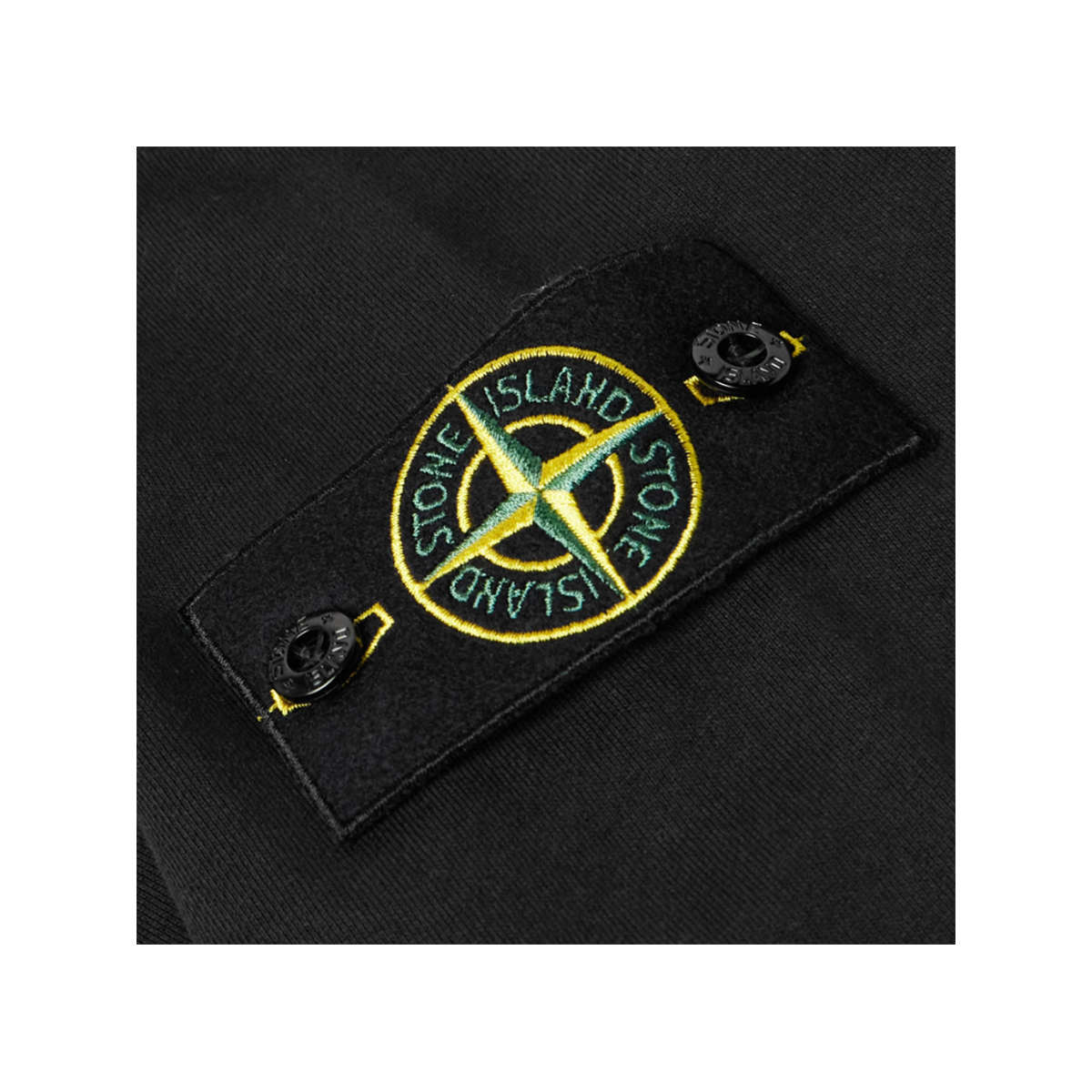STONE ISLAND  LOGO APPLIQUED GARMENT DYED SWEATER IN BLACK