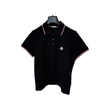 MONCLER LOGO BADGE POLO SHIRT IN BLACK