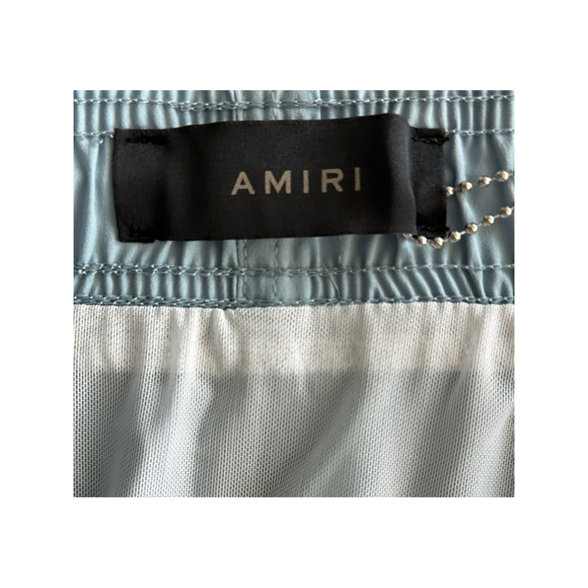 AMIRI MA BAR LOGO SWIM SHORTS IN BLUE