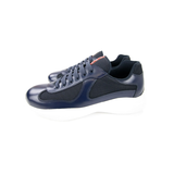 PRADA AMERICAS CUP PATENT LEATHER AND NYLON TRAINERS IN NAVY
