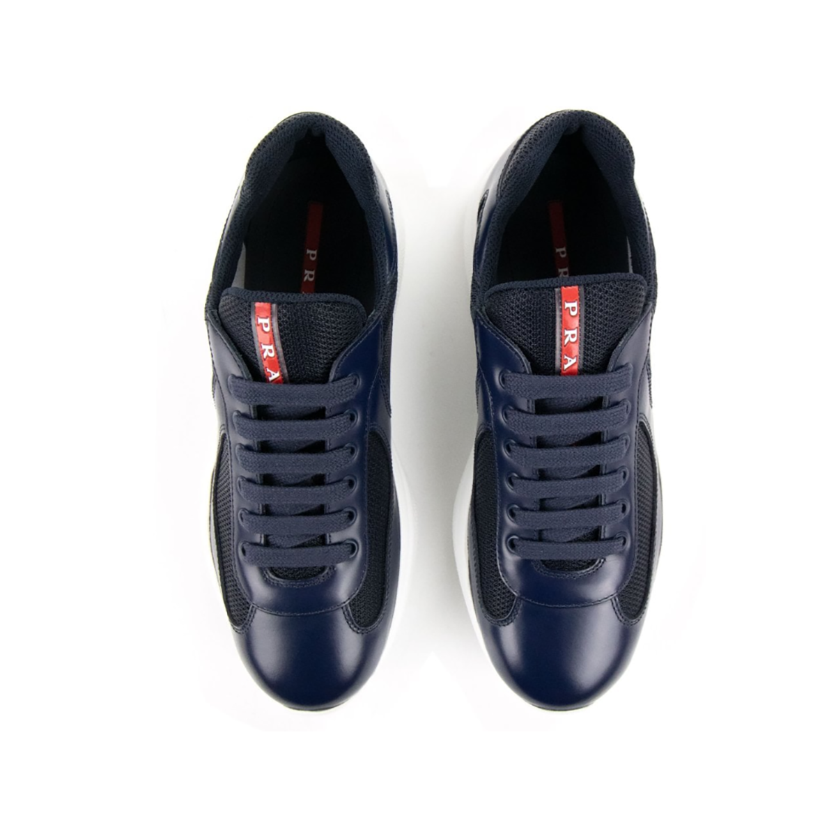 PRADA AMERICAS CUP PATENT LEATHER AND NYLON TRAINERS IN NAVY