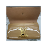 PRELOVED LOUIS VUITTON BEIGE LOGO CLUTCH