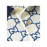GUCCI LOGO GG EMBROIDERED POLO IN WHITE