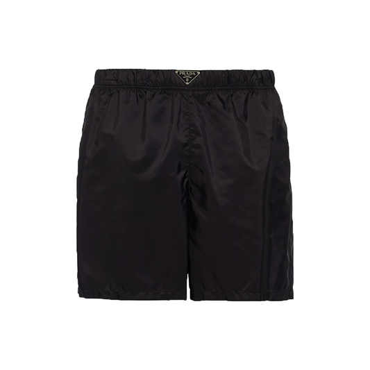 PRADA RE-NYLON LOGO BADGE SWIM SHORTS IN BLACK
