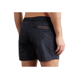 MONCLER STRAIGHT LEG LOGO PATCH SWIM SHORTS IN BLUE