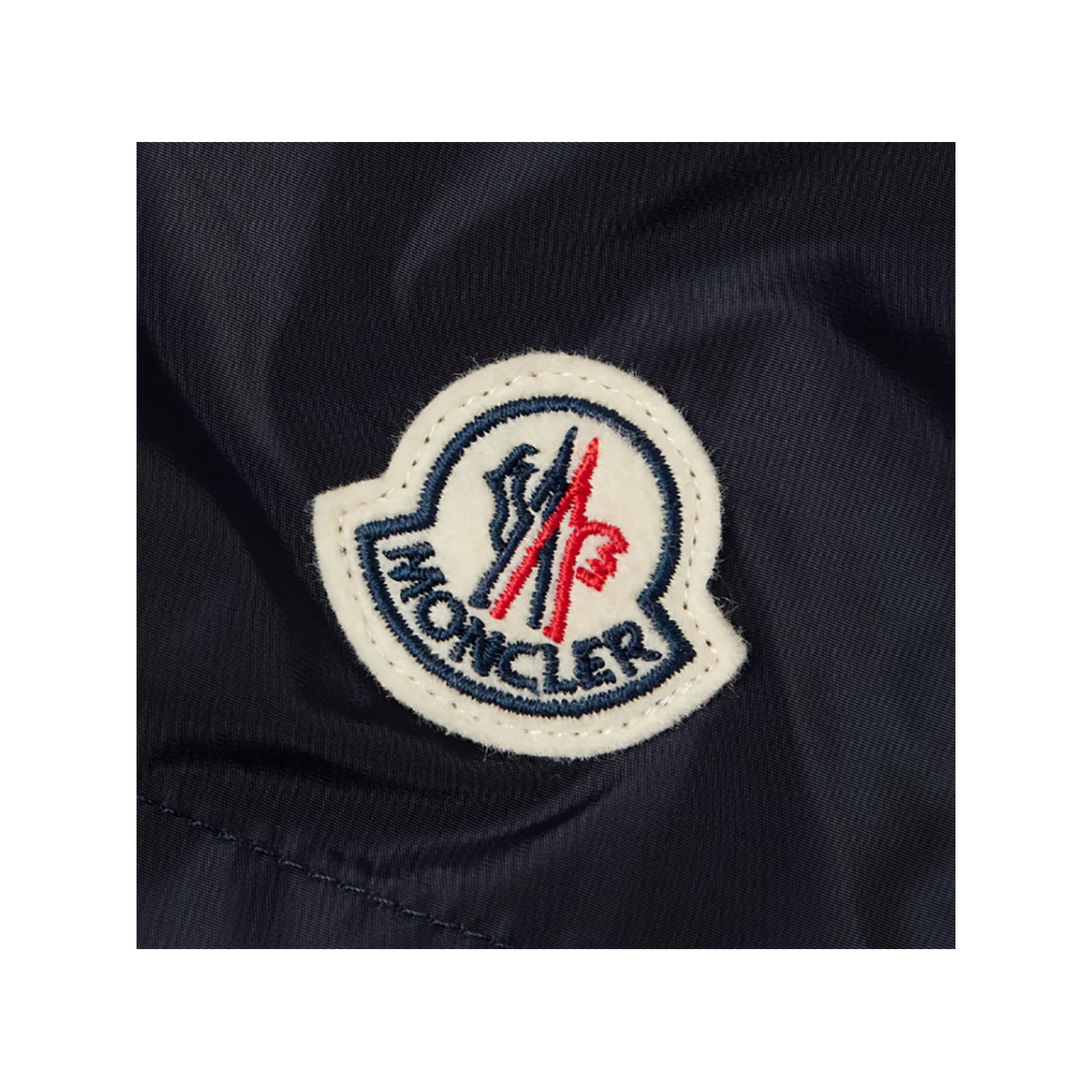 MONCLER STRAIGHT LEG LOGO PATCH SWIM SHORTS IN BLUE