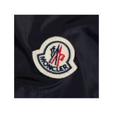 MONCLER STRAIGHT LEG LOGO PATCH SWIM SHORTS IN BLUE