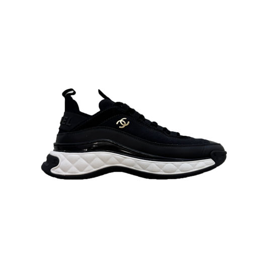 PREOVED CHANEL VELVET CALFSKIN CC TRAINERS IN BLACK