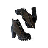 PRELOVED LOUIS VUITTON STAR TRAIL MONOGRAM BOOTS IN BROWN