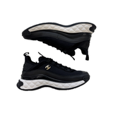 PREOVED CHANEL VELVET CALFSKIN CC TRAINERS IN BLACK