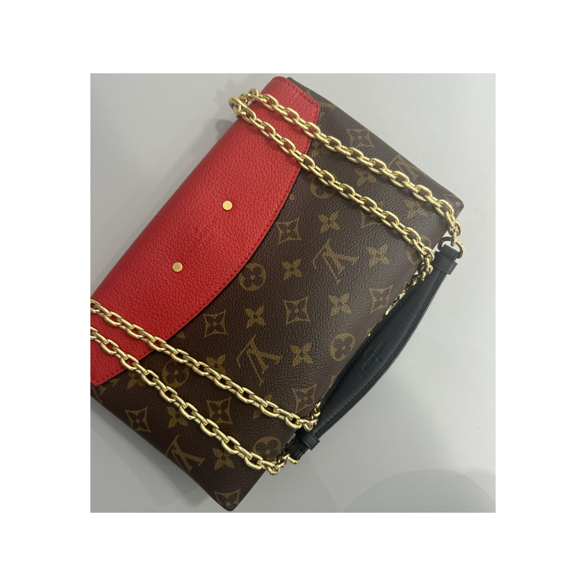 LOUIS VUITTON SAINT PLACIDE MONOGRAM AND RED BAG