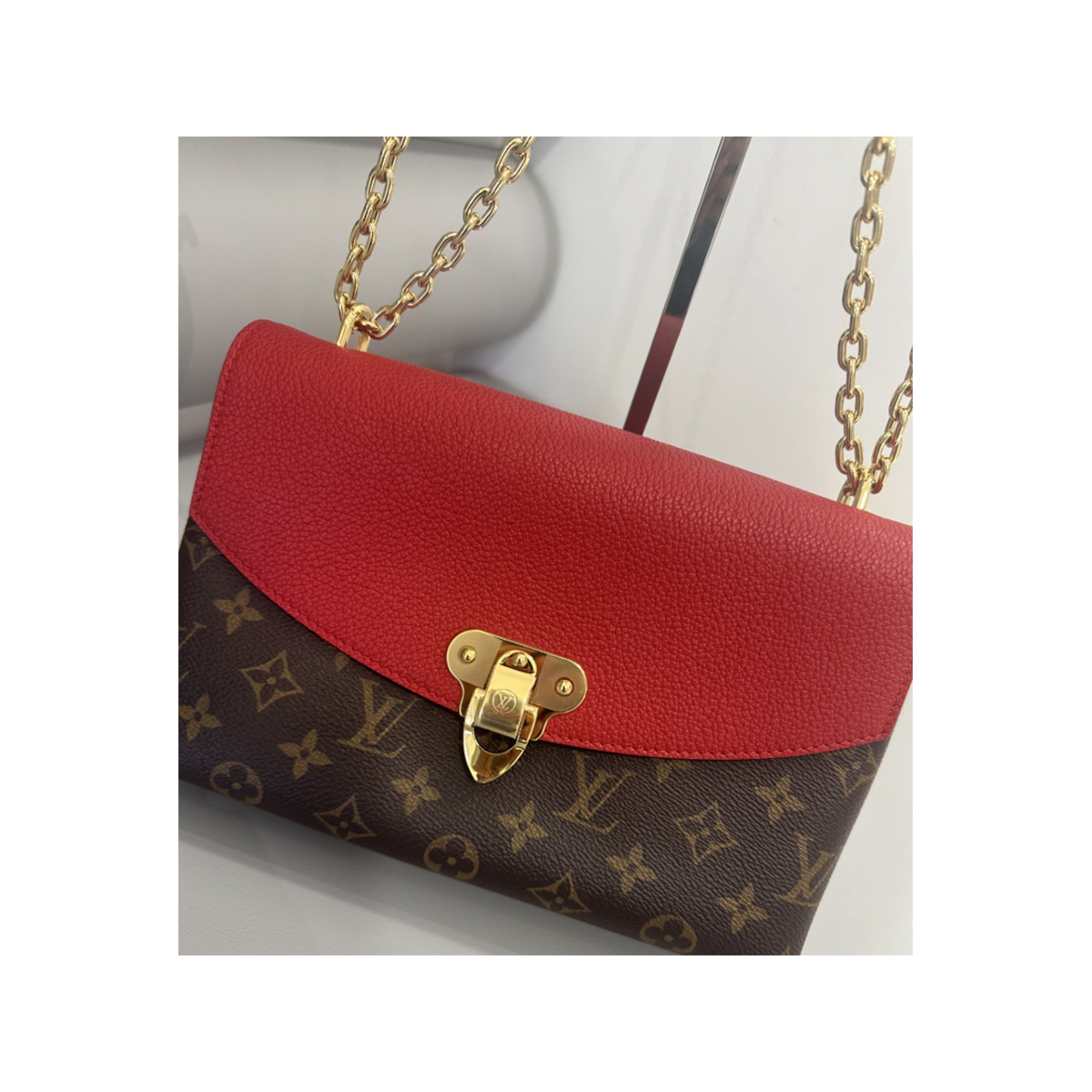 LOUIS VUITTON SAINT PLACIDE MONOGRAM AND RED BAG