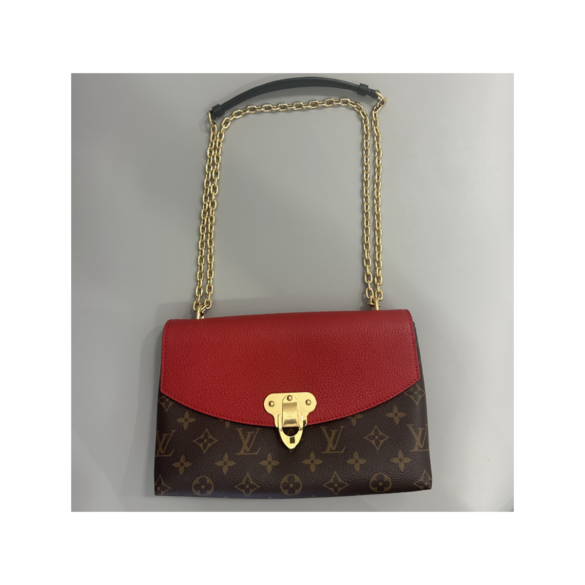 LOUIS VUITTON SAINT PLACIDE MONOGRAM AND RED BAG