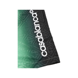 CASABLANCA STRAIGHT-LEG DEGRADE LOGO SWIMSHORTS IN GREEN
