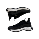 PREOVED CHANEL VELVET CALFSKIN CC TRAINERS IN BLACK